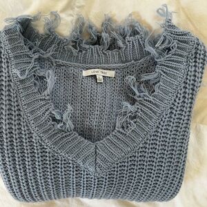 blue/grey sweater